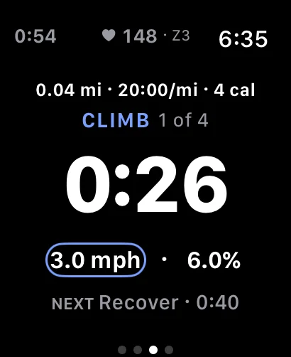 Apple Watch mid-workout: climb segment 1 of 4, countdown, speed and incline targets, live heart rate